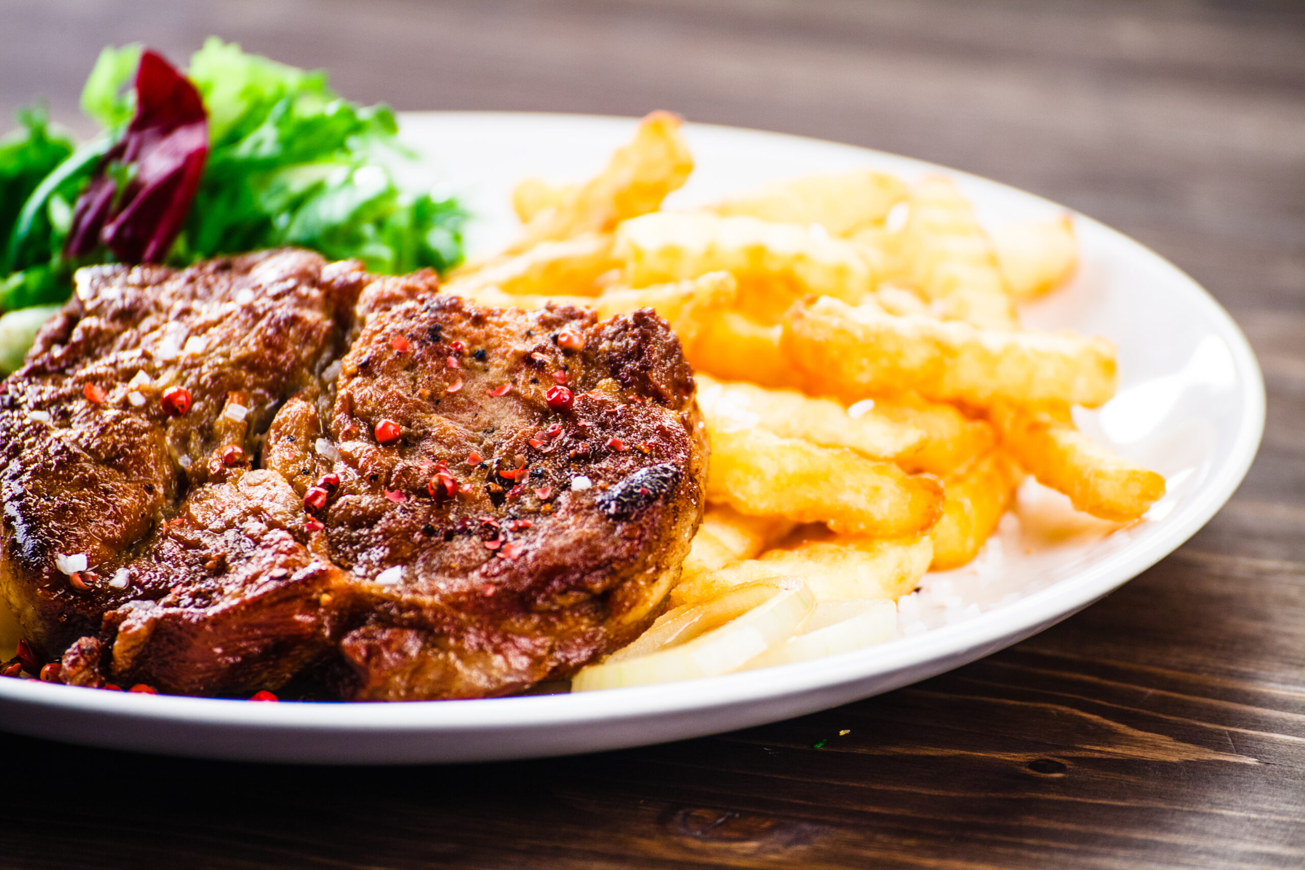 grilled-beefsteak-with-french-fries-and-vegetable-2026-01-11-08-21-00-utc